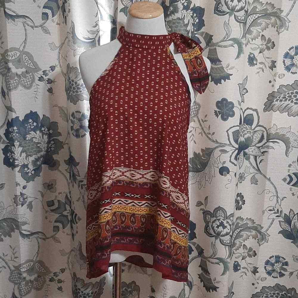 Freesia aztec print tie neck top in size large. Brick Red